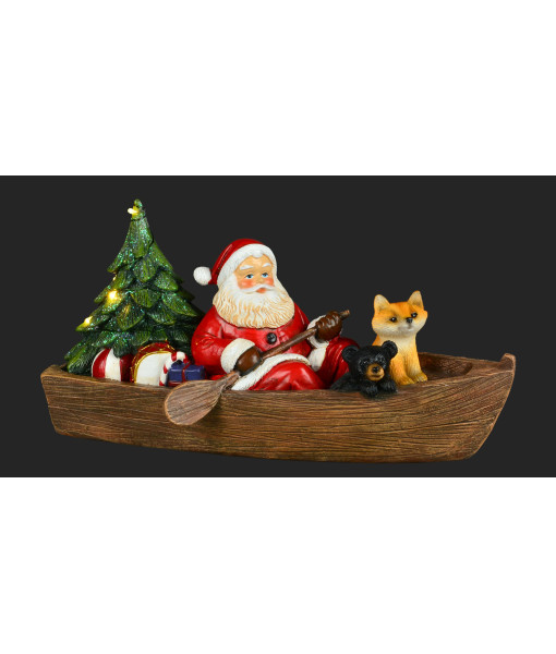 Père Noël en canot avec animaux