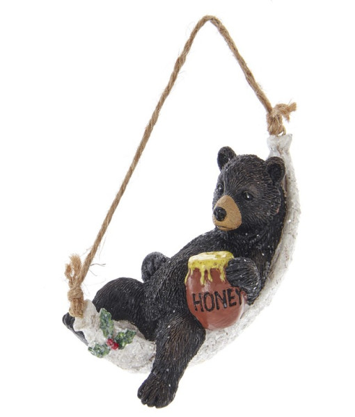 Ornament, bear on birch branch with honey.