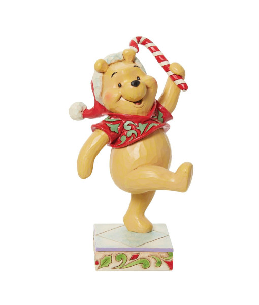 Winnie l'ourson et sa canne de sucre