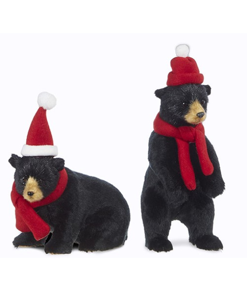 Ornament. Furry black bear with red scarf and hat.