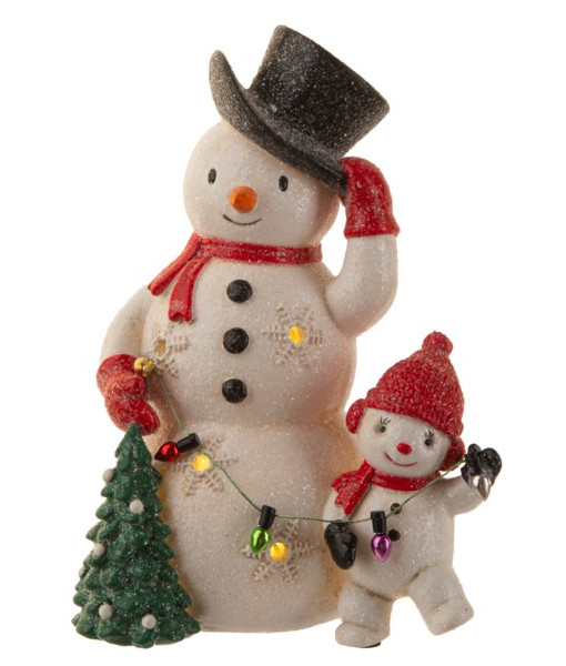 Décoration de table, bonhomme de neige joyeux et enfant. Éclairage LED.