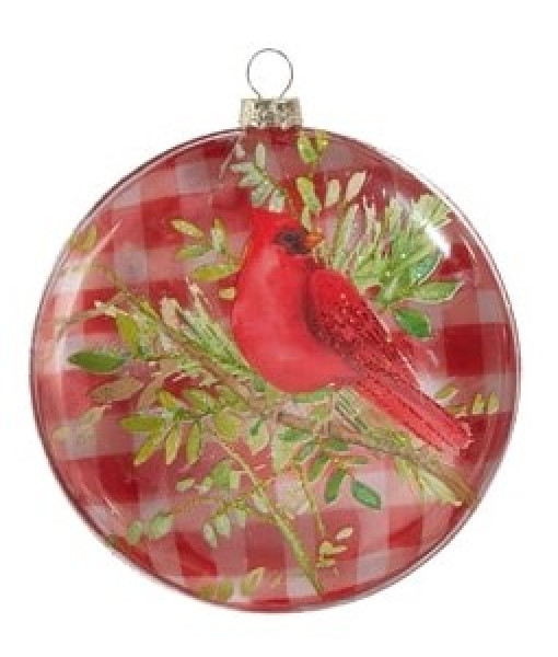 Ornement en forme de disque en verre, cardinal sur une branche.