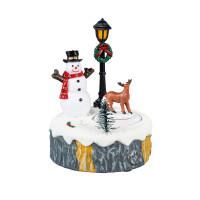 Décoration musicale illuminée, scène de Noël sur une souche d'arbre, avec bonhomme de neige et cerf