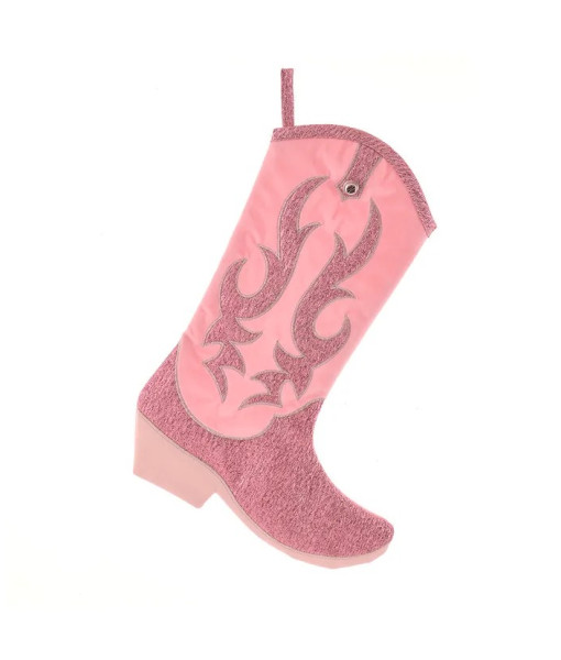 Décor, botte western de Noël en velours rose. Décor, botte western de Noël en velours rose.