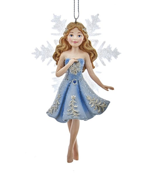 Fée avec robe bleue et ailes en flocon de neige