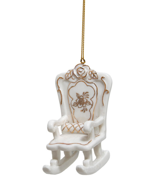 Ornement en porcelaine, chaise dorée et blanche.