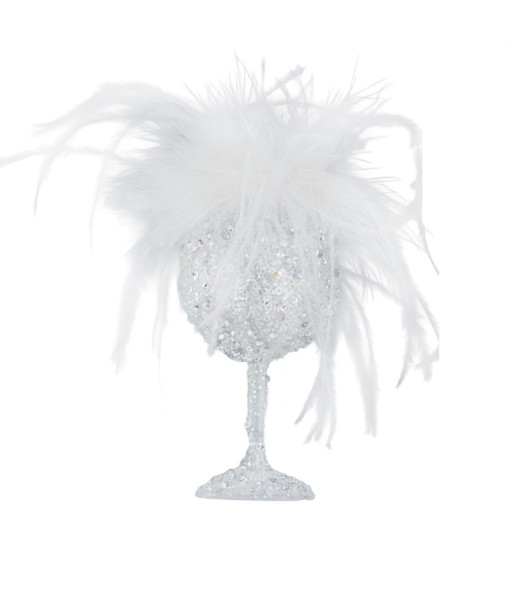 Ornement de verre à champagne avec plumes.
